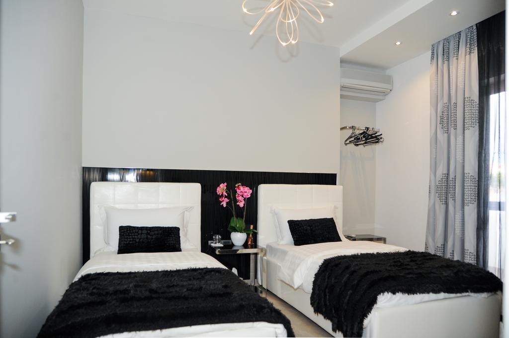Tiranatop Suites Номер фото