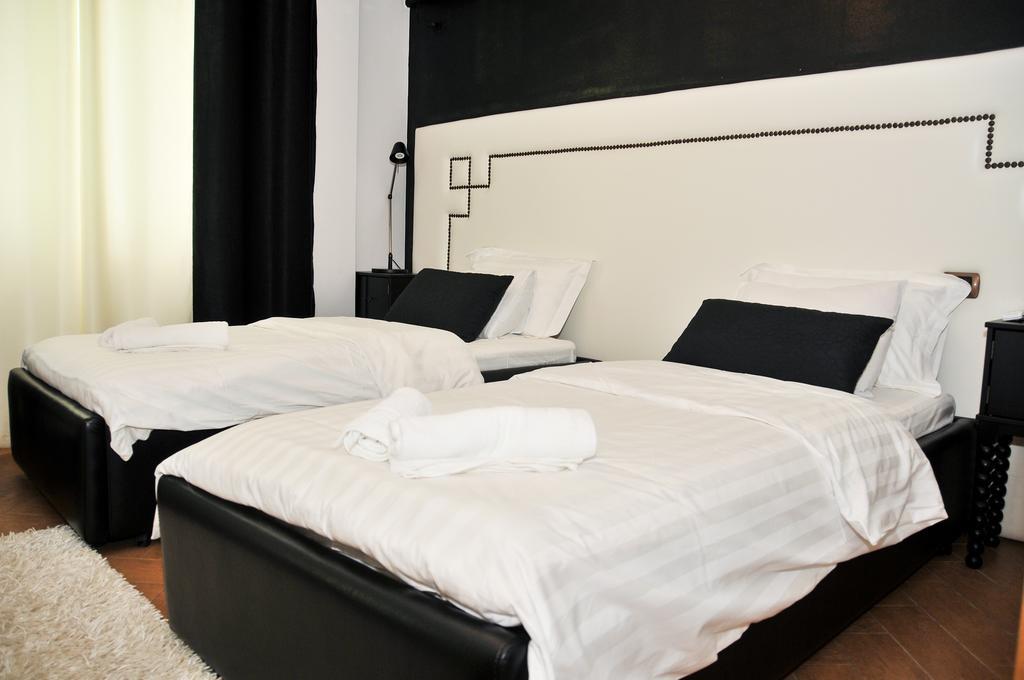 Tiranatop Suites Номер фото